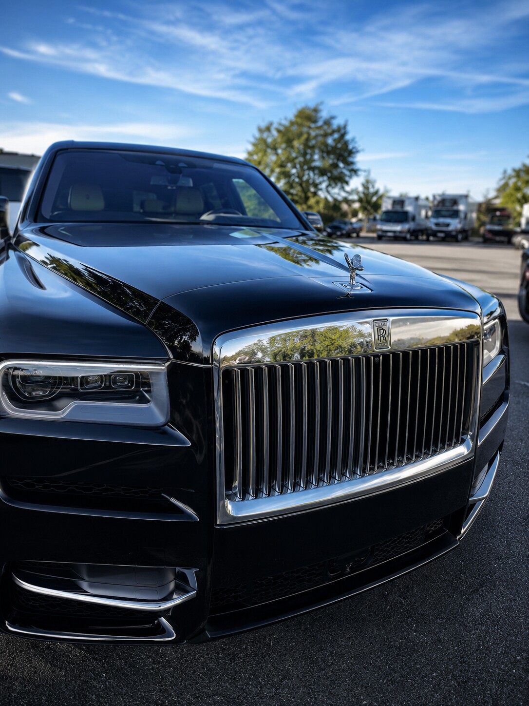 Black Rolls-Royce with a polished exterior finish at Crown Detail Hub